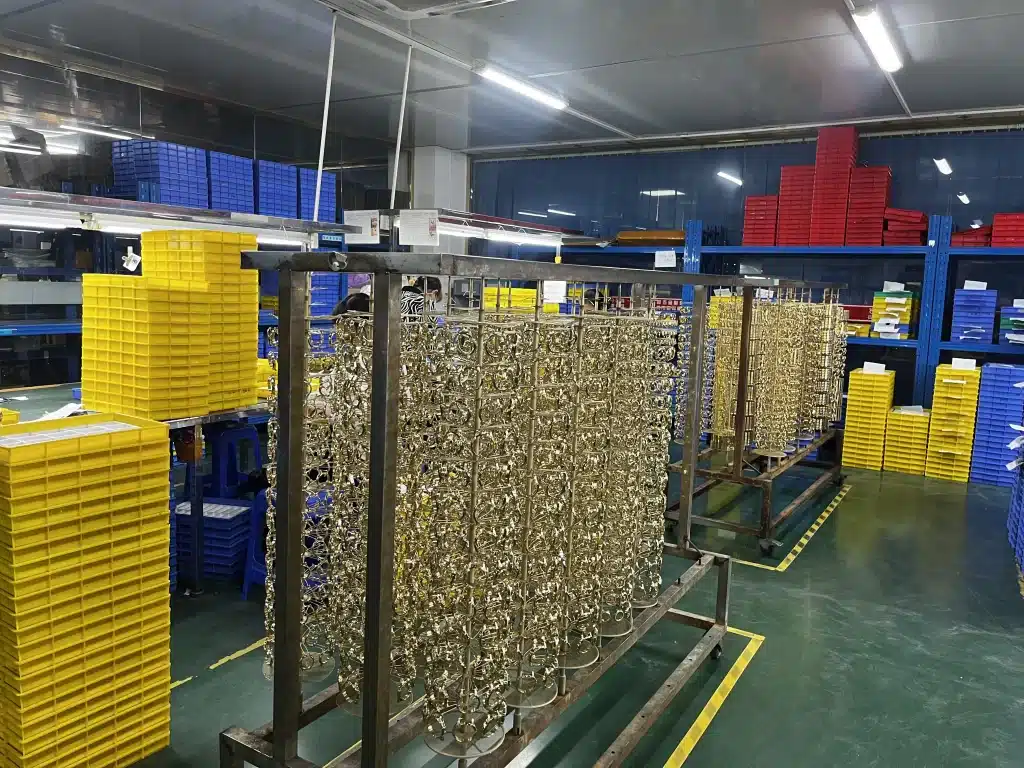 Gold-Plated Jewelry: Layers, Labels and Quality Checks 5 Jewelry components arranged on production racks