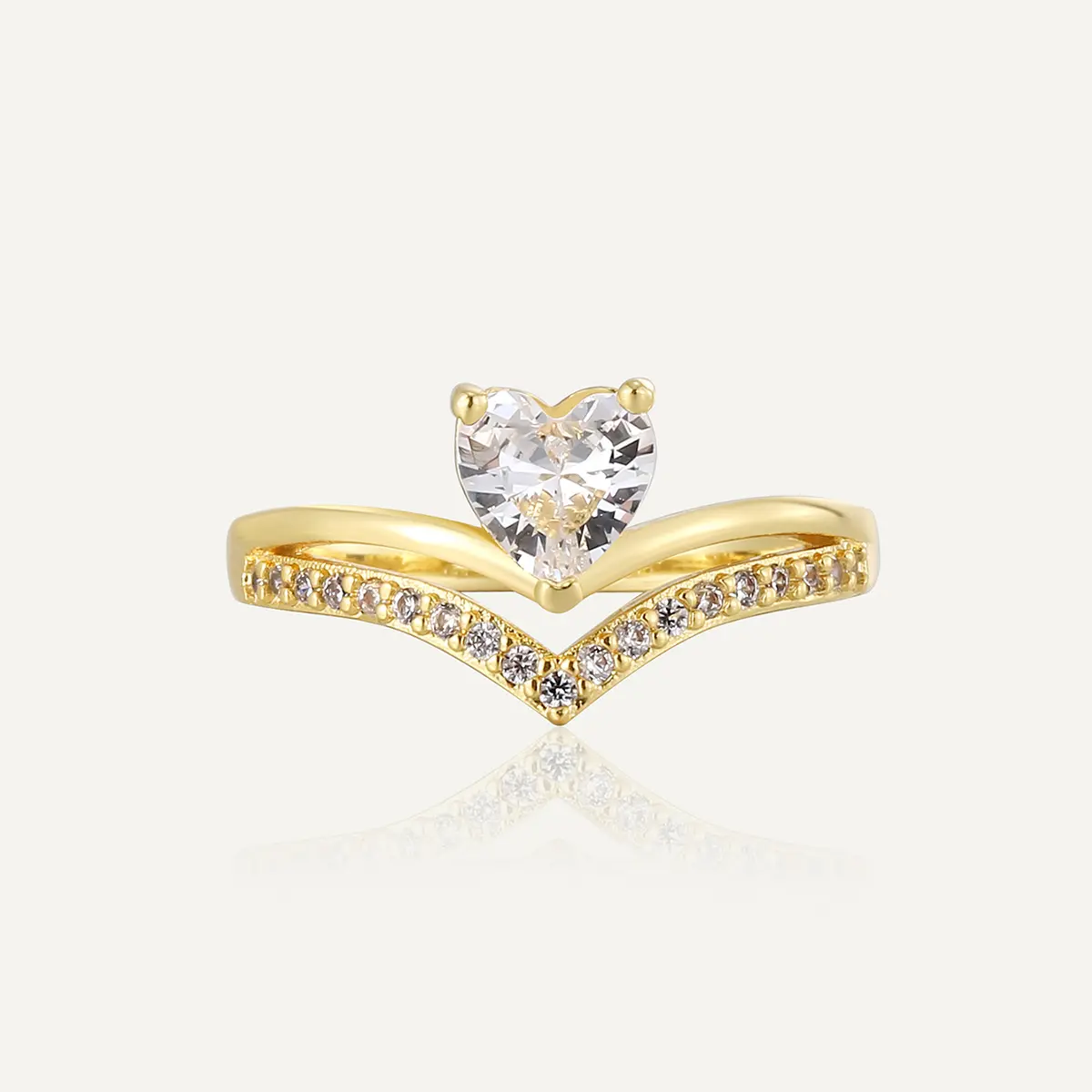 Gold crisscross ring with cubic zirconia