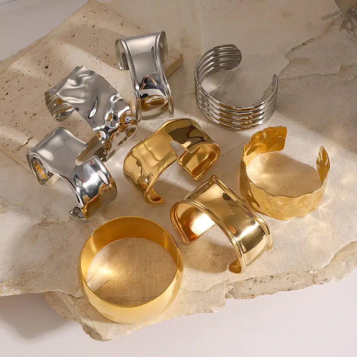 Collection of gold rings and crystal jewelry pieces