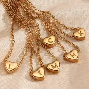 Gold tassel pendant necklaces with unique patterns