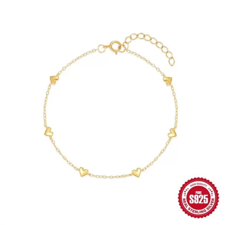 Delicate gold chain bracelet with small details
