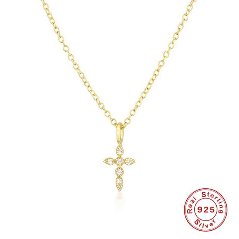 Gold chain bracelet with star-shaped charms and crystals