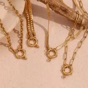 Gold necklaces with abstract and minimalist designs