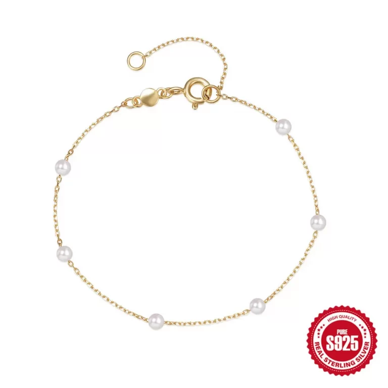 Gold chain bracelet with small beaded details