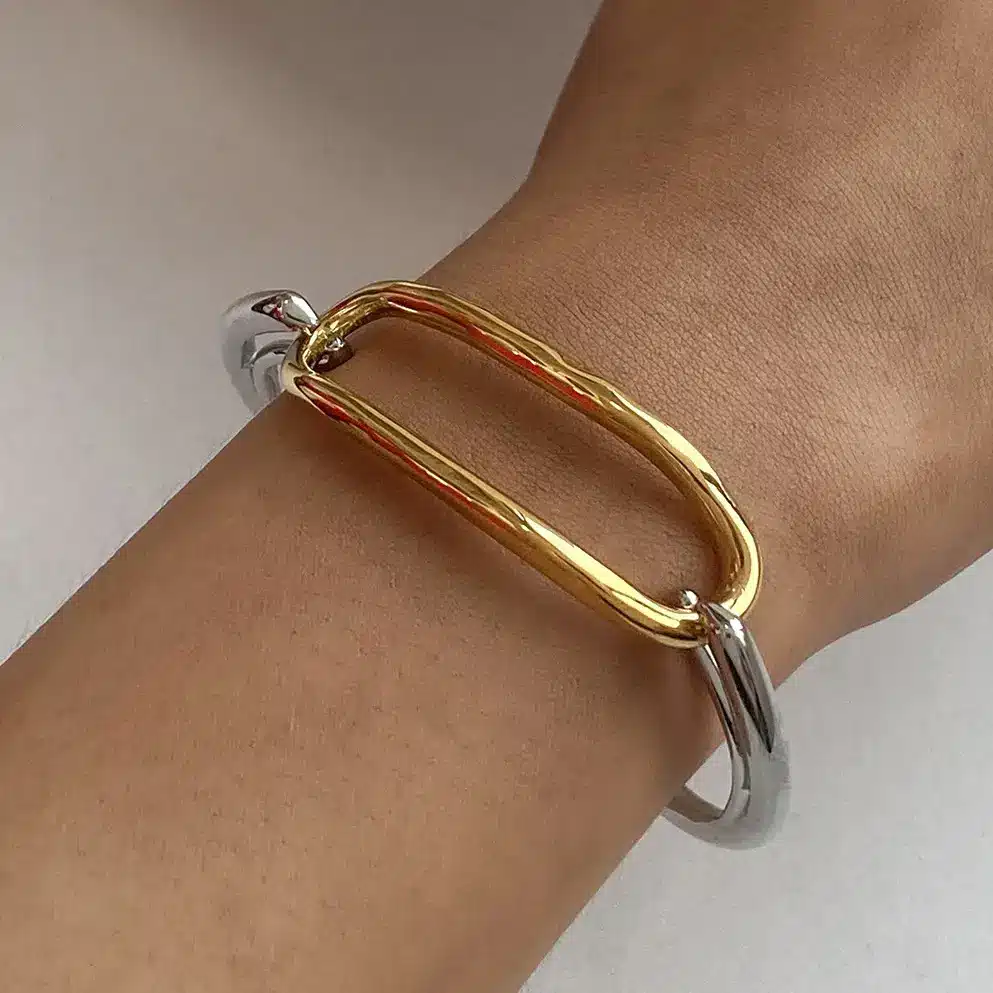 Minimalist gold bar bracelet with sleek curved design