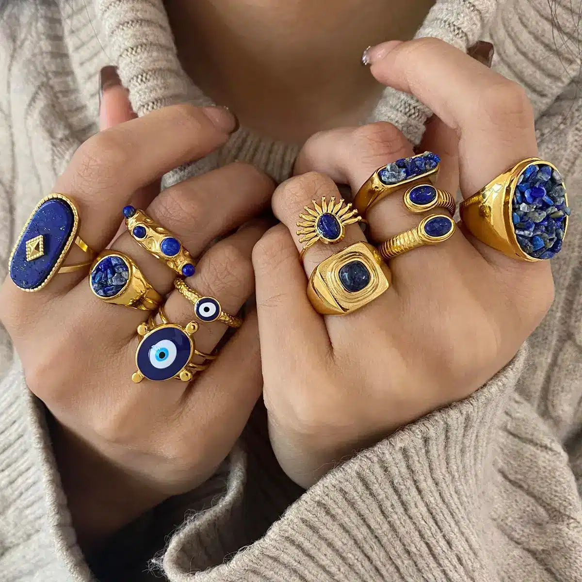 Retro punk style rings with blue enamel details and mixed metal designs