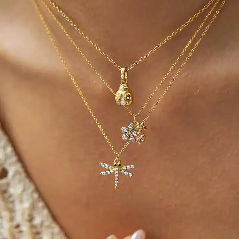Stainless Steel Jewelry 12 Triple Layered Gold Stainless Steel Necklace with Crystal Dragonfly and Flower Pendant - Wholesale Supplier