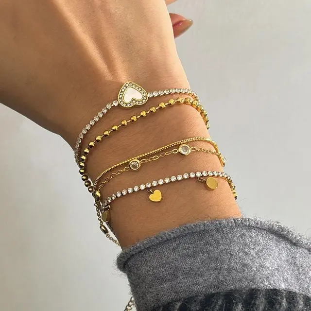 Stainless Steel Jewelry 47 Minimalist gold heart charm bracelet layered set with crystals