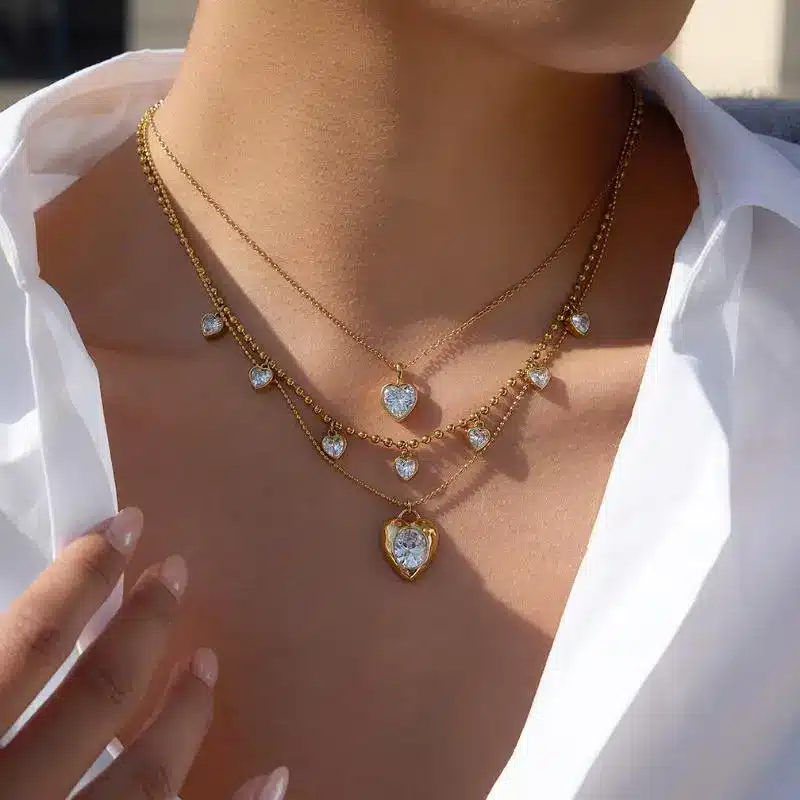 Stainless Steel Jewelry 3 Layered Gold Plated Necklace with White Shell Heart Charms and Crystal Accents