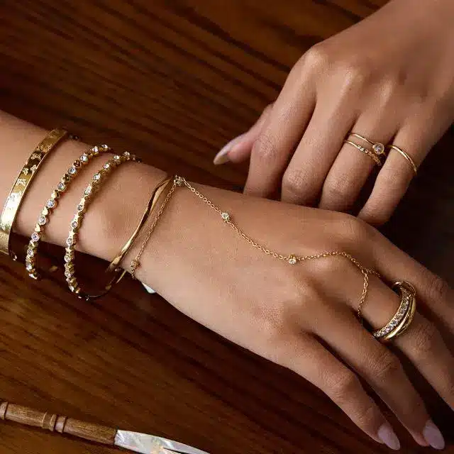 Stainless Steel Jewelry 42 Dainty gold hand chain bracelet connected to ring