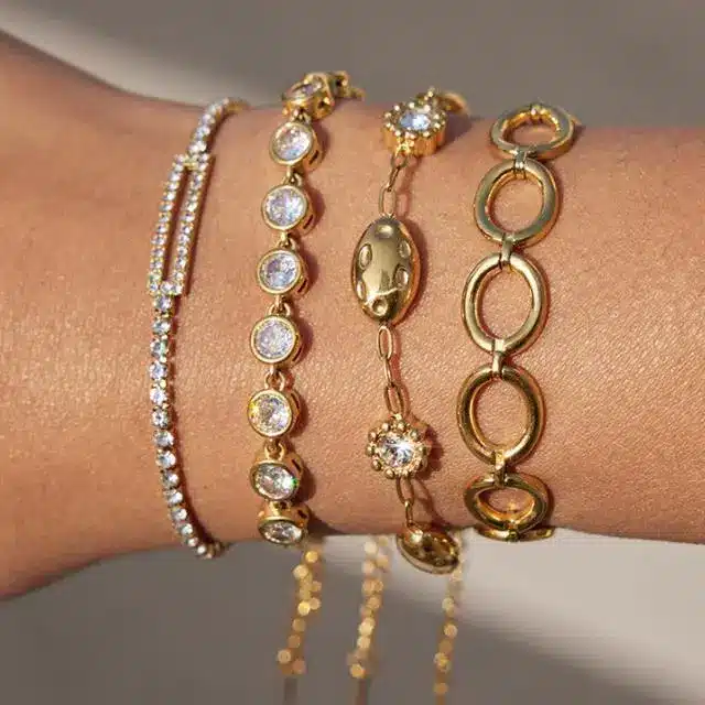 Stainless Steel Jewelry 38 Layered gold bracelet set with crystal bezels and paperclip chain
