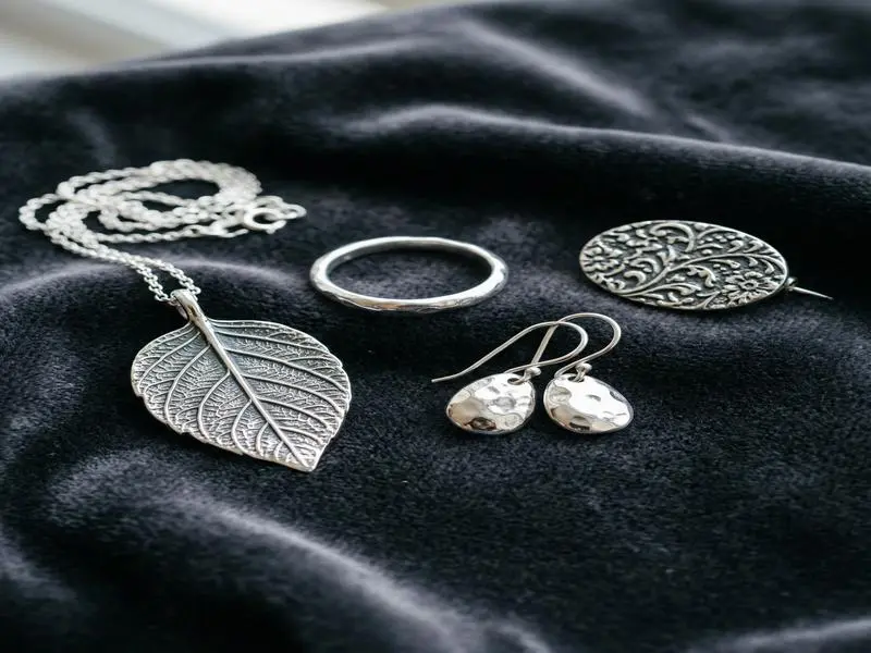 Silver Clay: The Complete Beginner's Guide to Making Real Silver Jewelry at Home 5 silver clay finished polished jewelry pieces b51d7e76b17b4eb68483cd6c9c0a0506