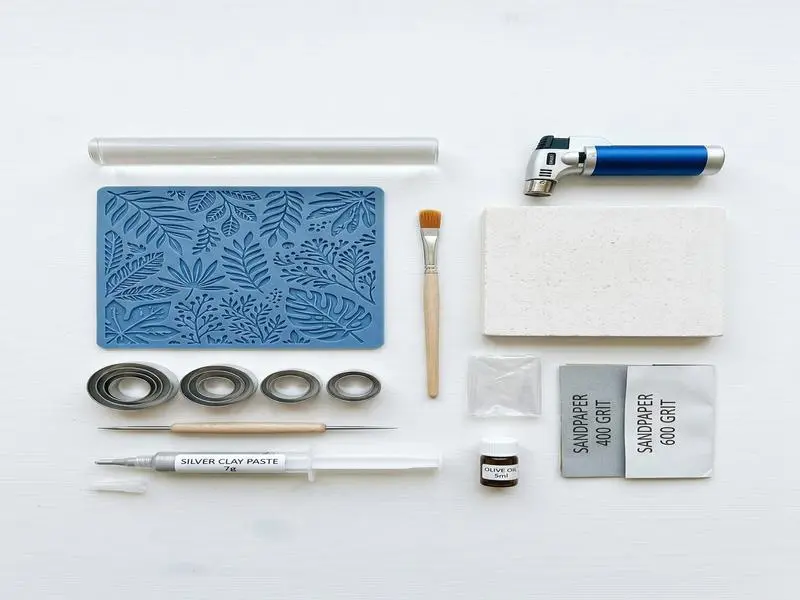 Silver Clay: The Complete Beginner's Guide to Making Real Silver Jewelry at Home 3 silver clay tools beginner kit layout cc1cbb22056e4ae8ae56b55e1a1a86e8