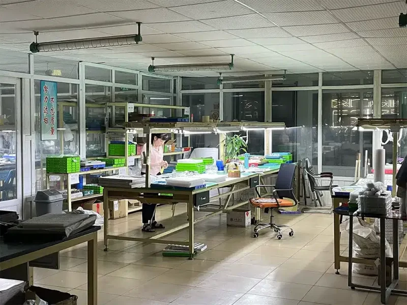 Jewelry workshop with multiple workstations and bright lighting