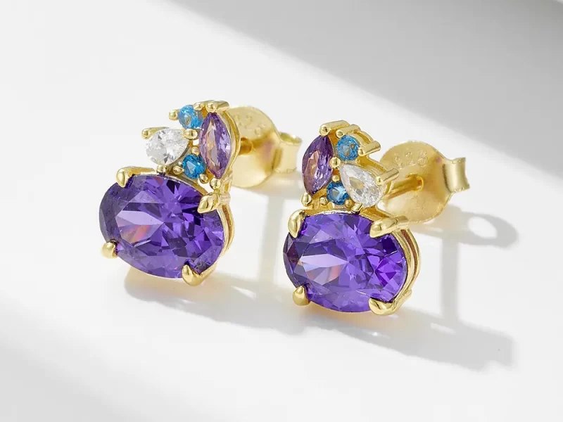 Gold stud earrings with purple amethyst stones